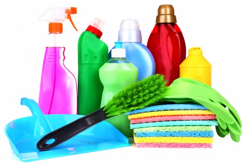 Deep cleaning in a home kitchen with detailed surface cleaning