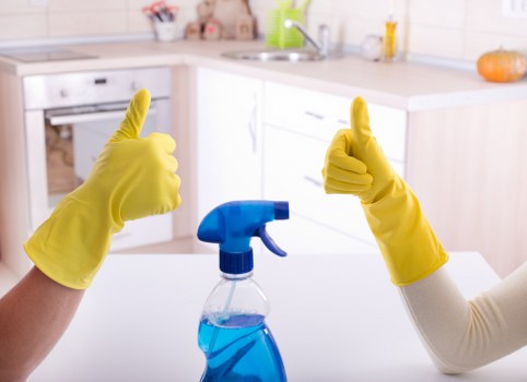 Housekeeping preparing a bedroom for an Airbnb guest