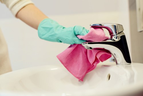 Removing a fresh stain from a fabric couch with a cloth